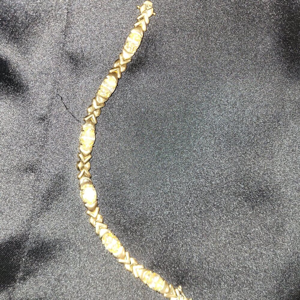 Bracelet with yellow CZ. Stamped .925 Silver with vermeil overlay  NWOT!!!!!!!